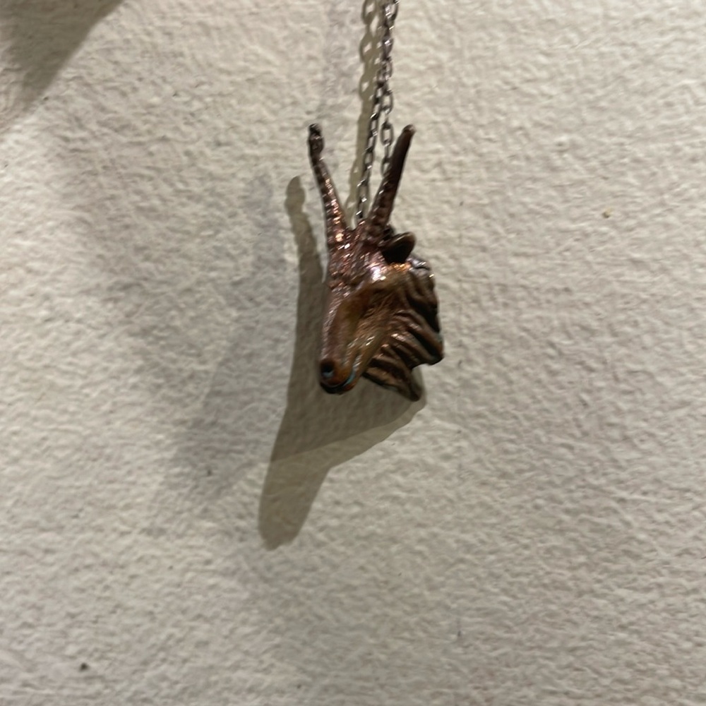 Vera Meat goat head necklace